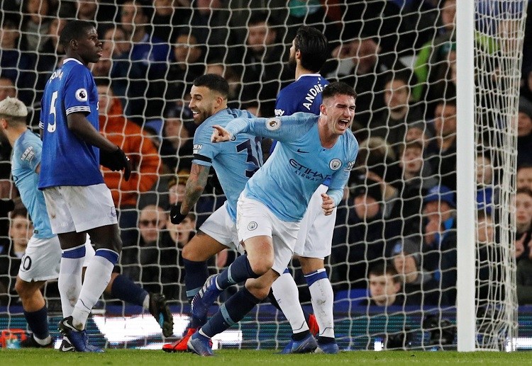 Defender Aymeric Laporte help put Manchester City back on top of Premier League with win over Everton.
