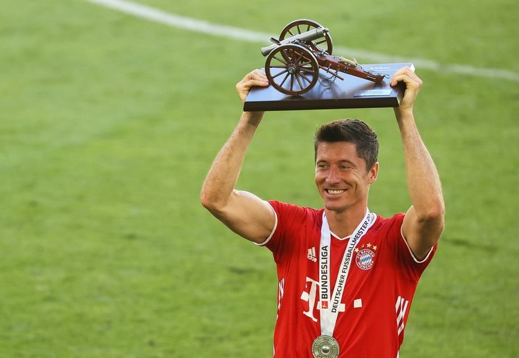 Bayern Munich star Robert Lewandowski lifts the leading goalscorer in Bundesliga trophy