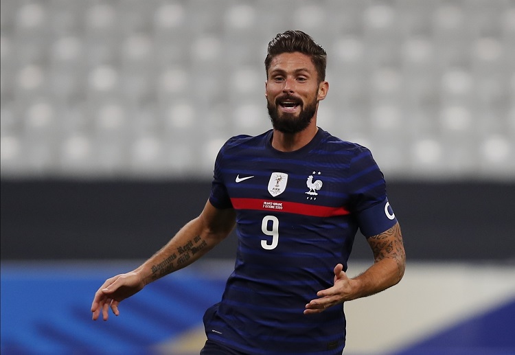 Brace Olivier Giroud di laga persahabatan membuatnya cetak rekor baru