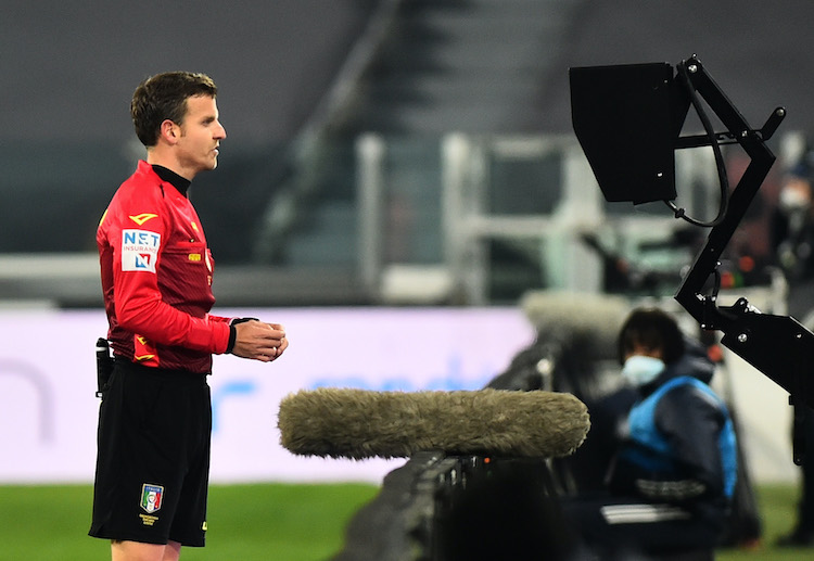 The referee gives Juan Cuadrado a red card after an awful challenge on Gaetano Catrovilli during a recent Serie A match