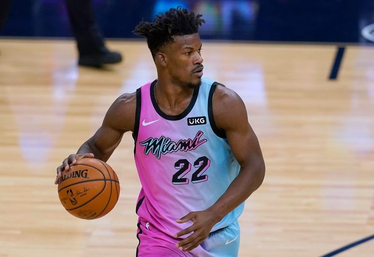 Jimmy Butler eyes to spearhead Miami Heat in beating the Sacramento Kings in upcoming NBA matchday Miami Heat's Jimmy Butler dribbles the ball during their recent NBA match against the Golden State Warriors