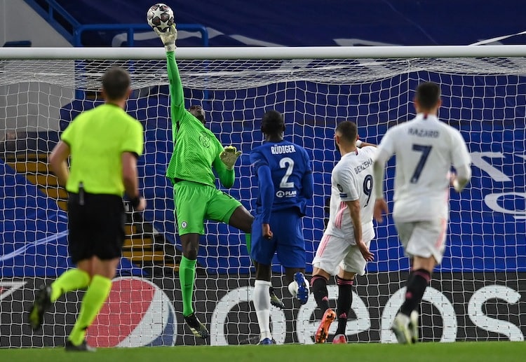 Real Madrid's attempts are denied and saved by Chelsea goalkeeper Edouard Mendy during their Champions League match