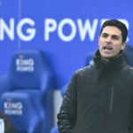 Arsenal remained in the Premier League title race for another week