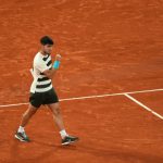 Carlos Alcaraz booked his place in the French Open final after Lorenzo Musetti retired with a left-leg injury